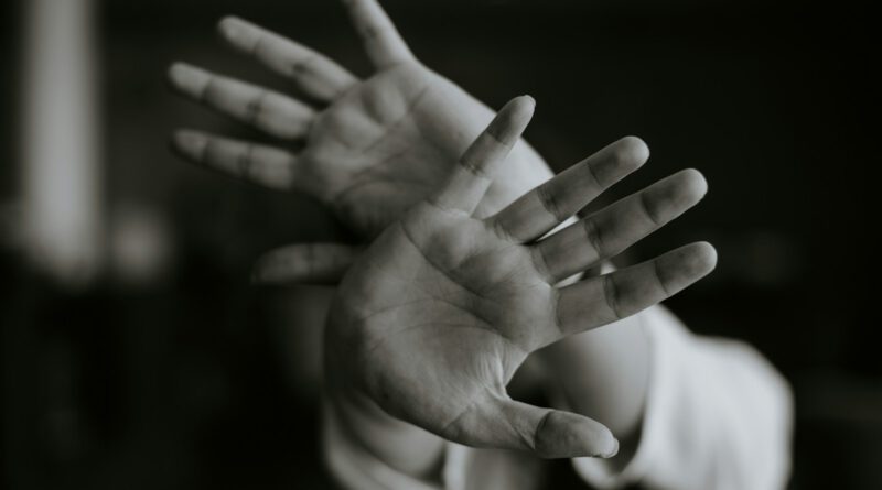 person stretching their hands