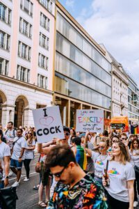 a crowd of people marching in a street