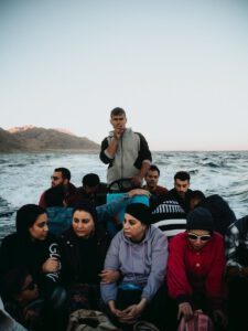 A group of people on a boat experiencing a sea journey near Dahab, Egypt.