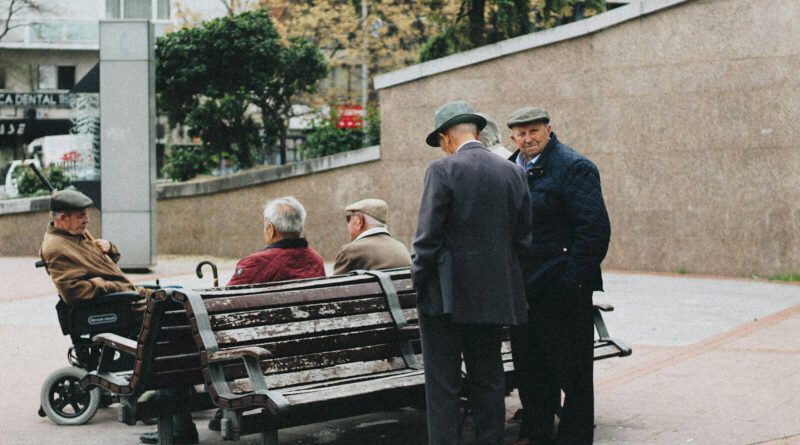 man sitting on bench